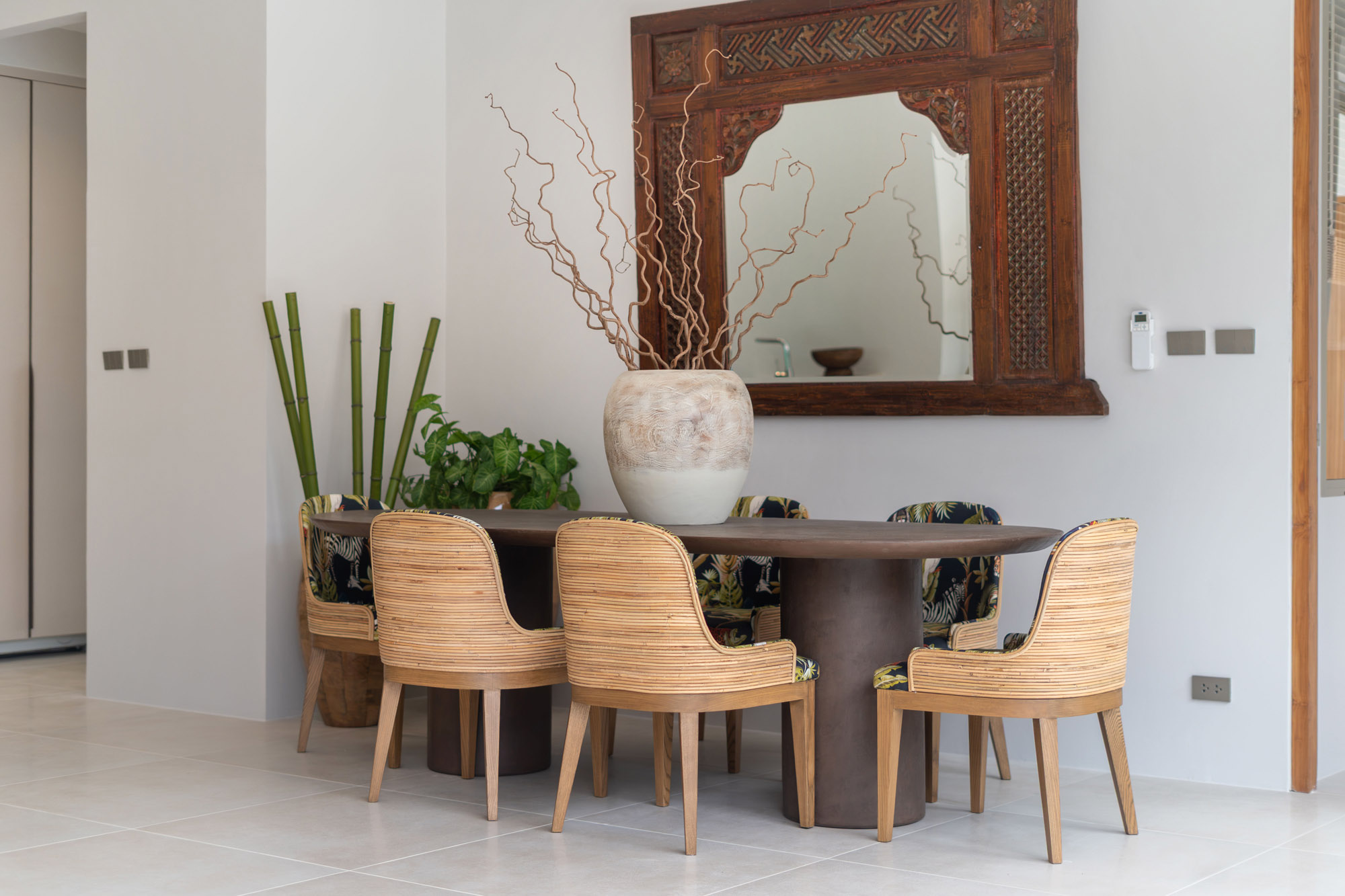 Dining area with Pagoda Bangkok furnishings at Bangtao Beach Villa